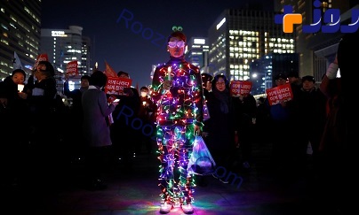 اعتراض عجیب و غریب  شهروند کره‌جنوبی به برکناری رئیس‌جمهور + عکس