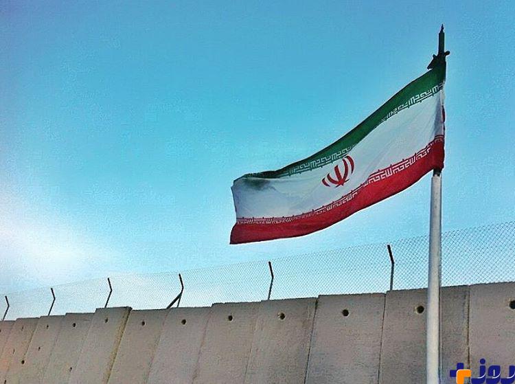 پرچم ایران پشت دیوار حائل اسرائیلی در مرز با لبنان+ عکس