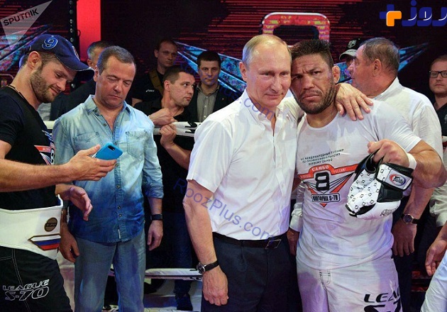 عکس/ قهرمان بوکس جهان در آغوش پوتین