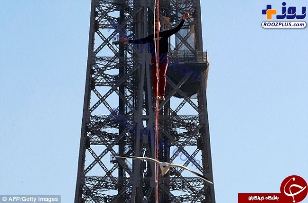 بندبازی هولناک یک پسر جوان بر روی برج ایفل +تصاویر