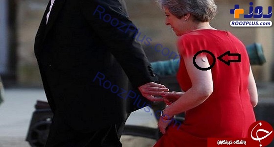عکس/ راز شیء مرموز روی دست نخست وزیر انگلیس چیست؟