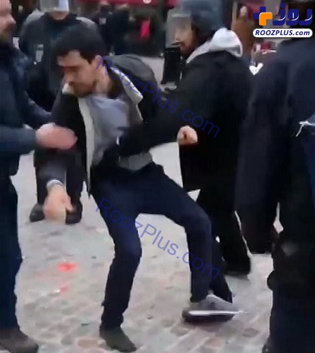 کتک زدن دانشجویان معترض توسط بادیگارد ماکرون +تصاویر