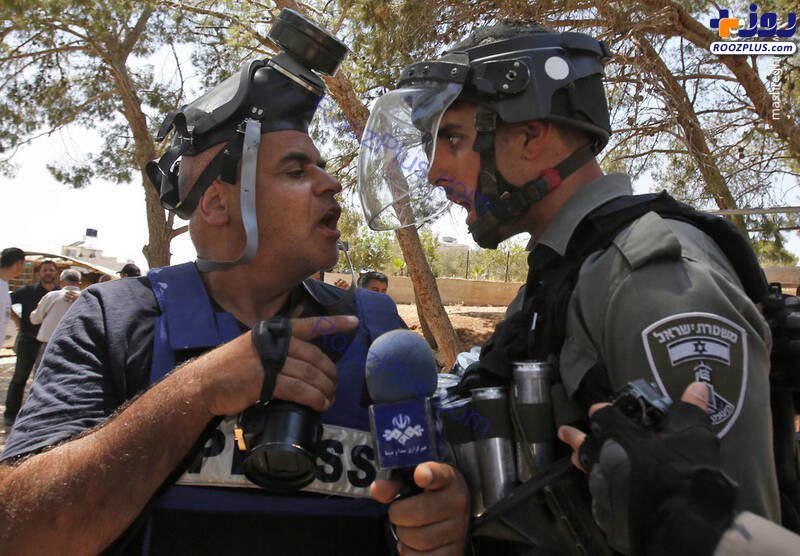 عکس/درگیری خبرنگار صداوسیما با سرباز اسرائیلی