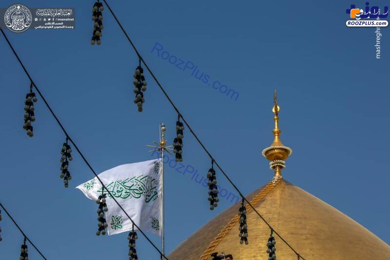 تعویض پرچم ایوان طلای حرم علوی(ع) +عکس
