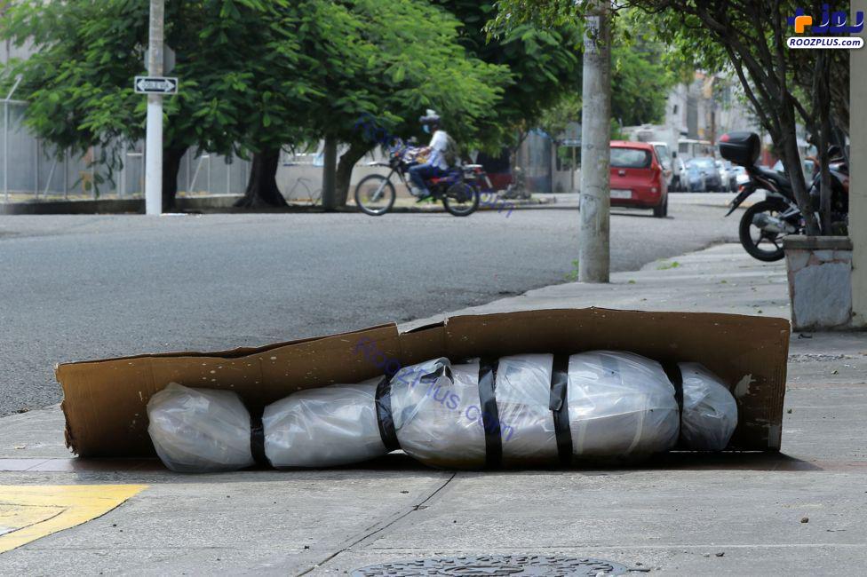 جسد یک قربانی کرونا در خیابان به سبک فیلم های آخرالزمانی +عکس