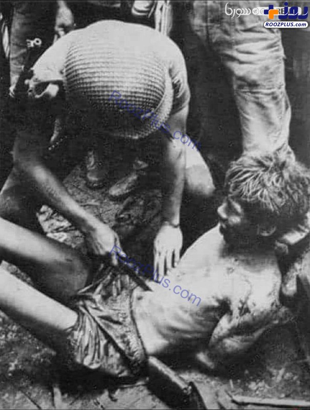 شکنجه عجیب اسیر ویتنامی توسط سرباز آمریکایی +عکس