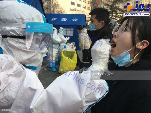 صف چینی ها برای تست کرونا در خیابان+عکس