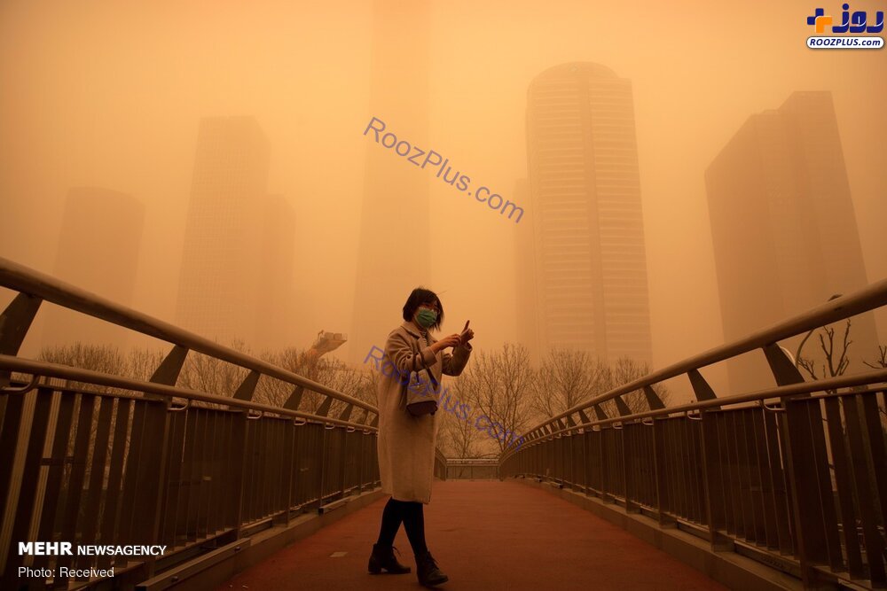 عکس/طوفان شن و گرد و غبار در آسمان پکن
