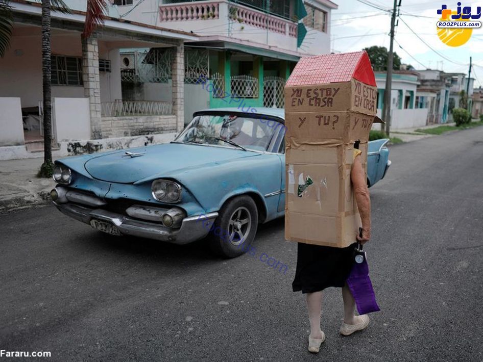 سپر مقوایی یک پیرزن برای مقابله با کرونا در خیابان!+عکس