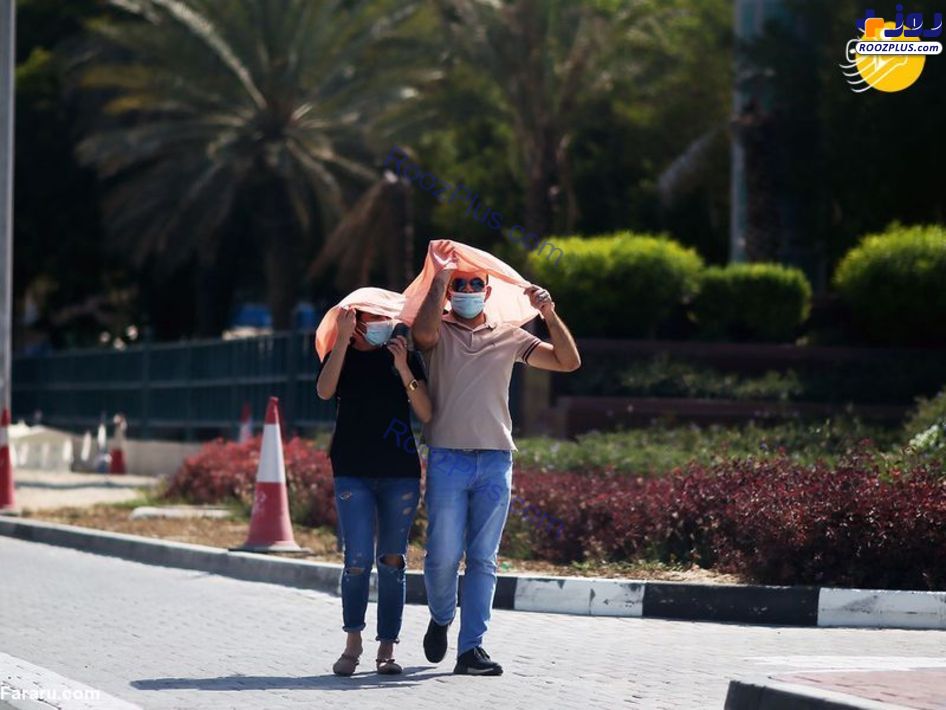 عکس/ راهکار مردم دبی برای فرار از گرما
