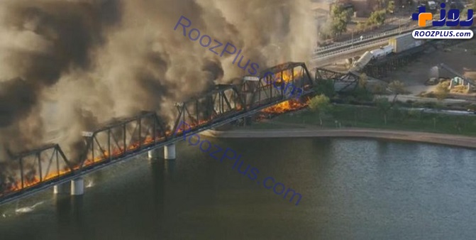 عکس/ آتش‌سوزی در قطار باری آمریکایی به ریزش پل منجر شد