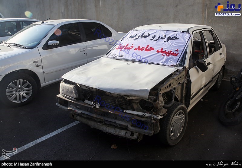 مراسم تشییع ماموری که به دست یک سارق خودرو شهید شد +عکس