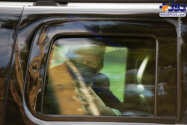 دیدار ترامپ با هواداران از پشت شیشه خودرو +عکس