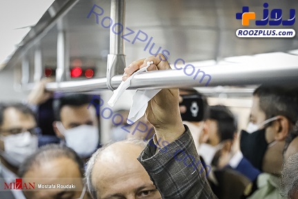 رفتار خاص علی ربیعی در شلوغی مترو + عکس