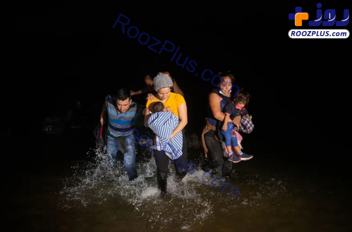 عکس/ عبور پرمخاطره پناهجویان از رودخانه مرزی به مرز ایالات متحده آمریکا
