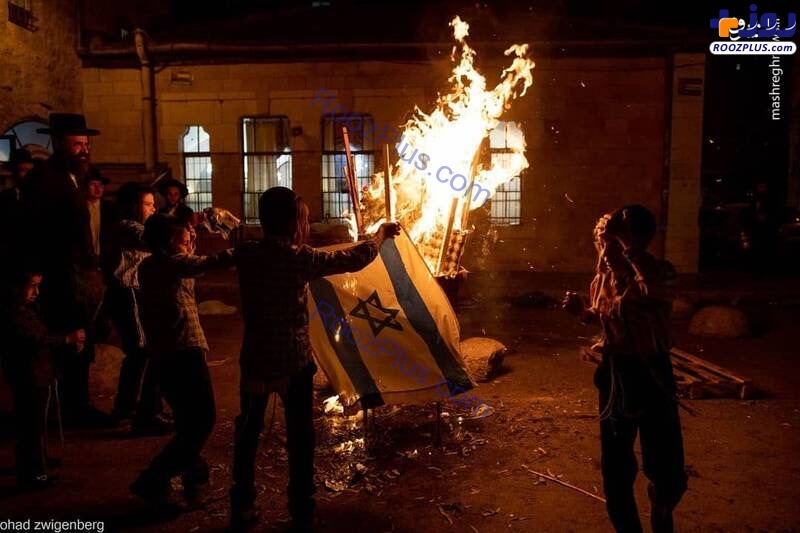 آتش زدن پرچم رژیم صهیونیستی توسط یهودیان +عکس
