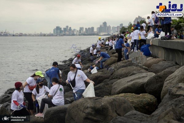 پاک‌سازی زباله‌ های ساحل توسط داوطلبان +عکس