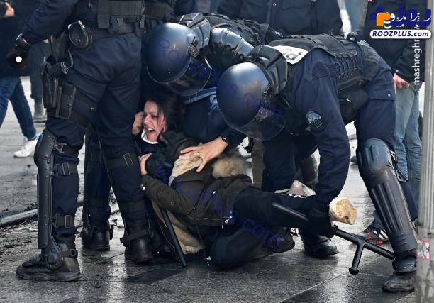 حمله پلیس فرانسه به یک زن+عکس