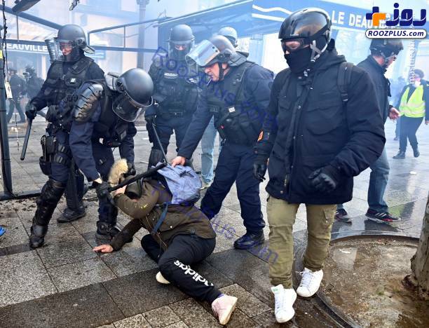 حمله پلیس فرانسه به یک زن+عکس