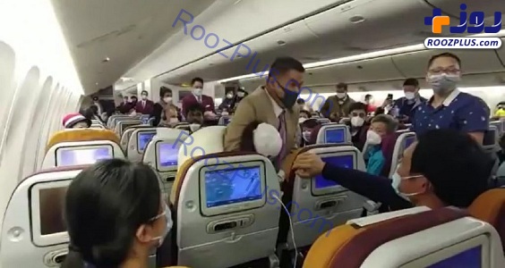 حمله به زنی که در هواپیما سرفه کرد+عکس