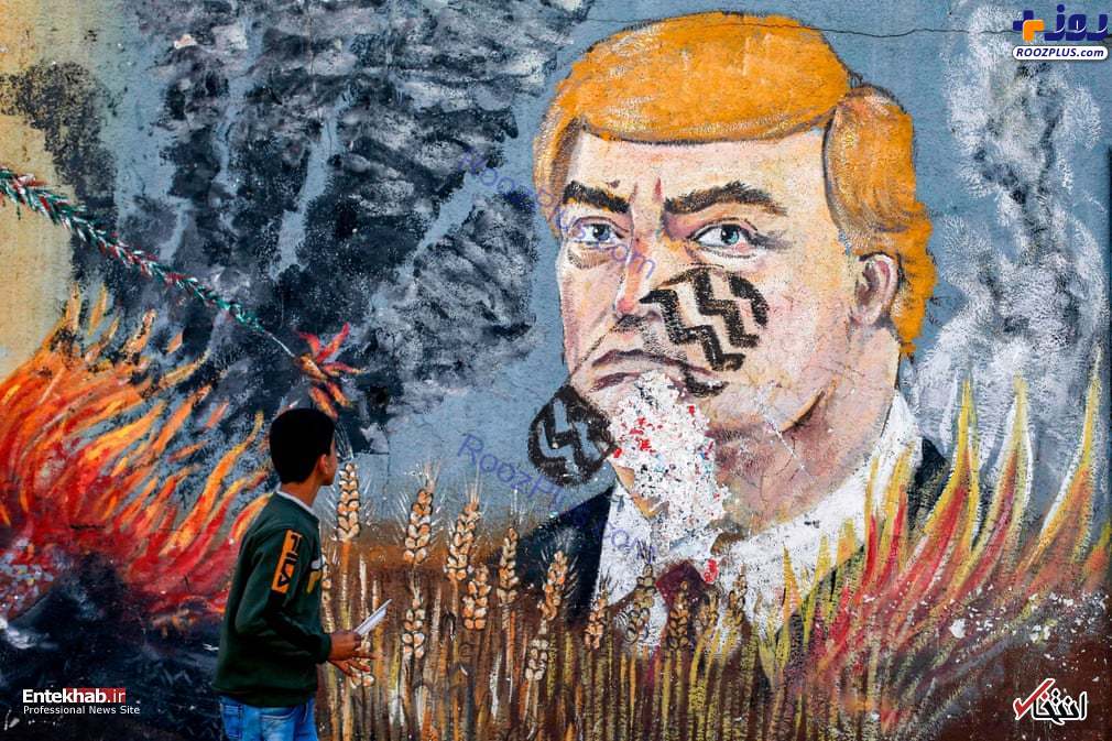 عکس/نقاشی دیواری از رئیس جمهور آمریکا روی دیوار غزه
