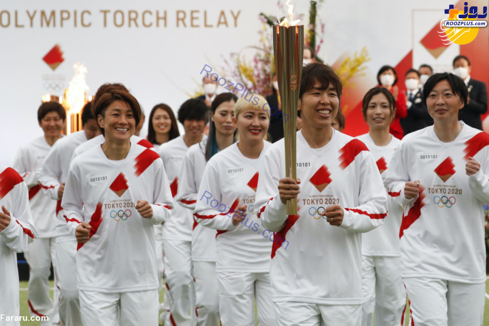 مراسم بی سر و صدای حمل مشعل المپیک در ژاپن+عکس