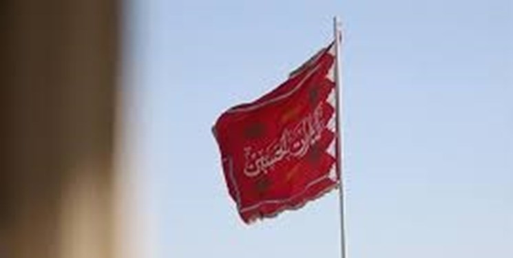 اهتزاز پرچم سرخ به یاد لاله‌های خونین شاهچراغ