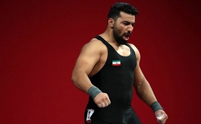 قهرمان وزنه برداری متهم به قتل تسلیم پلیس شد + عکس