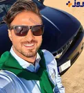 سلفی خواننده مشهور در کنار ماشین لوکس و گران قیمتش