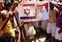 آتش زدن عکس بن زاید در تظاهرات همبستگی با فلسطین در جنوب یمن