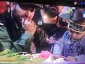 عكس/ چهره فرزند شهيد حججی كنار تابوت پدر