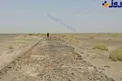 طوفان در کویر کرمان بقایای یک جاده تاریخی سنگفرش شده مربوط به دوره اشکانی را نمایان کرد+عکس