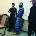 عكس/خواننده رپ متهم به قتل با دستبند و پابند