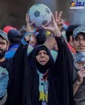تصویری از زن عراقی که با برد عراق مقابل ایران، جهانی شد!