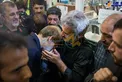 عکس/ بوسه لاریجانی بر دستان پدر شهید مدافع حرم محسن حججی