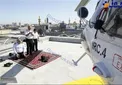 عکس/ نماز خلبانان امداد و نجات در پشت بام حرم رضوی