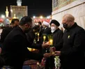 قالیباف با لباس خادمی در حرم امام رضا(ع) /عکس