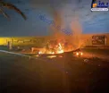 خودروی آتش گرفته در حمله آمریکا به فرودگاه بغداد/عکس