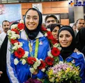 استقبال مردمی از کیمیا علیزاده در فرودگاه امام + عکس
