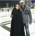 خانم بازیگر با چادر در کنار همسر هنرمندش در حرم + عکس