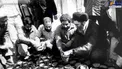 عکسی قدیمی از رهبر انقلاب در حال کاشت بذر نهال در دهه60