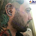 خالکوبی های خارج از عرف تتلو روی گوش و گردنش+عکس