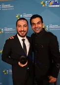 عکس یادگاری نویدمحمدزاده و رقیبش در استرالیا