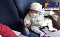 تصویری جالب از ماسک زدن یک نوزاد