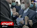 عکس/ وقتی پیرزن پلدختری یقه نوبخت را می‌گیرد!
