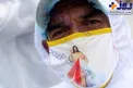ماسک متفاوت کارگر گورستان در روزهای کرونایی+عکس
