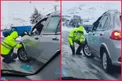 کار زیبای مامور ناجا در جاده برفی/عکس