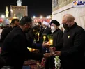 عکس/ دکتر قالیباف با لباس خادمی در حرم امام رضا(ع)
