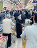 ازدحام جمعیت در فروشگاه در روزهای کرونایی+عکس