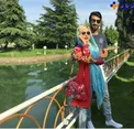 تیپ جالب فوتبالیست مشهور و همسرش در کنار دریاچه ای زیبا + عکس
